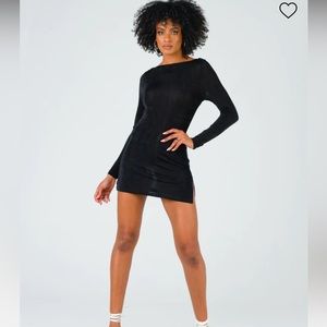 Never worn black mini dress with open back.